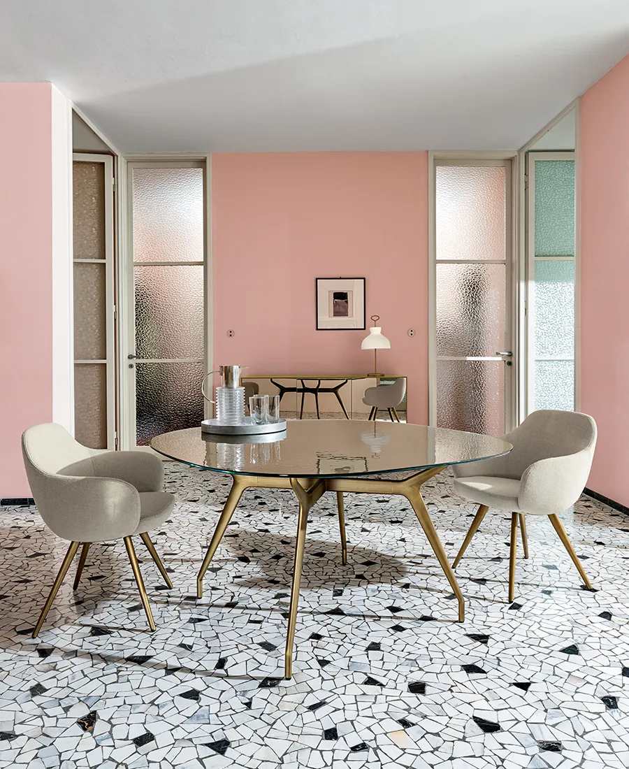 The Arkos shaped dining table, the Cadira chairs and Magda sideboard